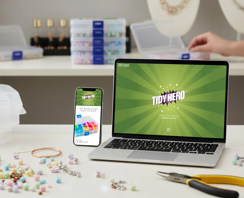 Responsive website design for Tidy Hero shown on laptop and phone.